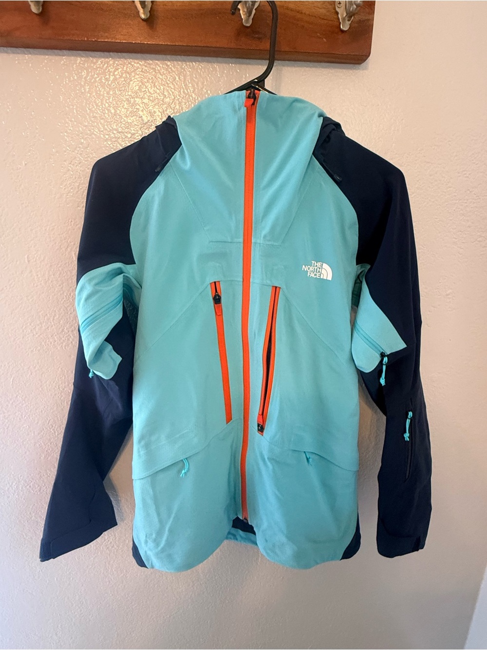 The North Face Aqua and Navy Hooded Shell with Orange Zips
